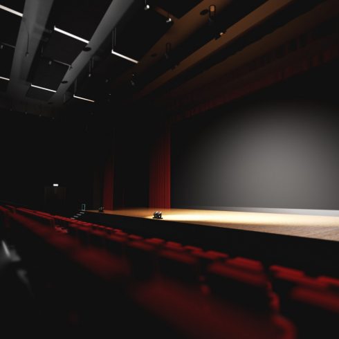 Theatre with empty stage in spotlight. Red theater curtain and seats